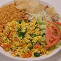  Mexican Style Eggs / Huevos A La Mexicana · Two eggs scrambled with tomato, jalapeÃ±os, onions and cilantro. Served with rice, refried p...