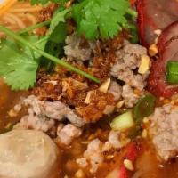 Thai Noodle Soup · Rice noodles in special Thai broth with choice of chicken, beef, or pork, served in a large ...