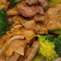 Pad See-U · Choice of chicken, beef or pork;
stir-fried with wide noodles, cabbage, broccoli, carrots, a...