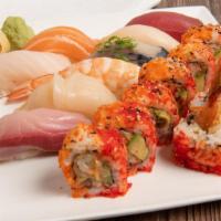 Sushi Deluxe · Shrimp tempura roll with eight pieces nigiri. Served with miso soup and salad.