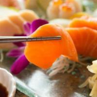 Sashimi Regular · Twelve pieces sashimi. Served with miso soup and salad.