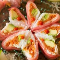 Heart Of Bowie Roll · Spicy tuna, avocado, tempura flakes rolled with soy paper, and wrapped with tuna.