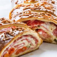 Regular Stromboli · Our secret sauce,  100% real cheese in our fresh dough.