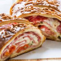 Meat Lover Stromboli · Our secret sauce,  100% real cheese in our fresh dough.