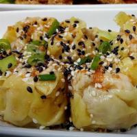 Steamed Dumplings · Chicken and shrimp, sweet sesame soy sauce.