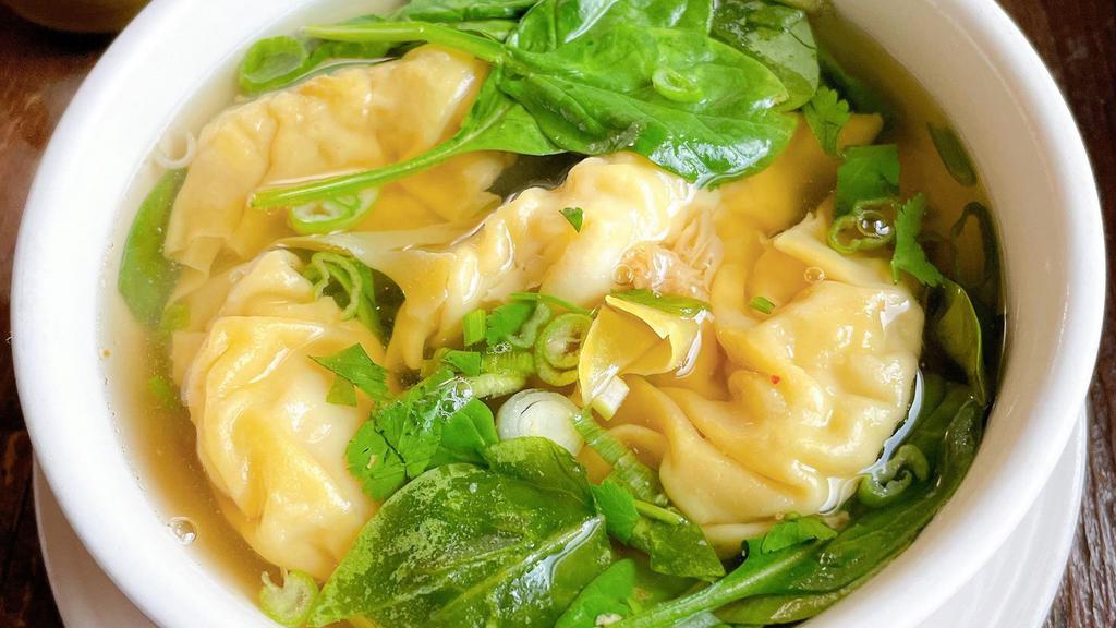 Wonton Soup · Chicken wontons, toasted garlic and spinach.