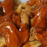 Fried Wings · Fried wings served with fries and bread.