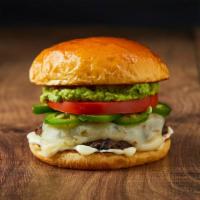 The Spicy Guacamole Burger · Beef patty, jalapenos, tomato, guacamole, and melted pepper jack cheese on a brioche bun.