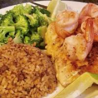 Grilled Red Snapper · Blackened or lemon peppered snapper. Topped with 4 shrimp. Served with dirty rice or steamed...