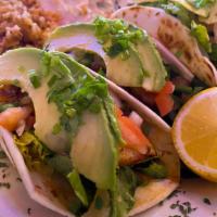 Fish Tacos · 3 pieces. Fresh crispy or grilled catfish with pico de gallo, lettuce, and Cheddar cheese. S...