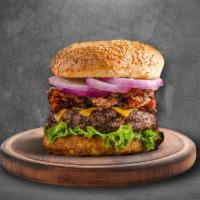 Capital Lamb Burger · 1/3 lb patty, tzatziki mixed greens, shaved onions, and roma tomato with your choice of brea...