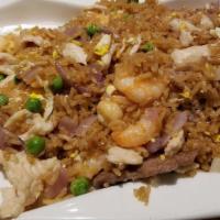 Fried Rice · Served with fried rice and egg roll or soda.