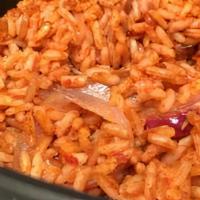Jollof Rice · Spiced rice simmered in special African seasonings.