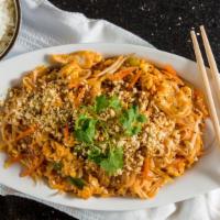 Pad Thai With Chicken · Spicy. Thai noodles with bean sprouts, eggs, carrots, cabbage, and scallions topped with cru...