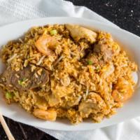 Tropical Thai Combo Fried Rice · Spicy. Mixture of pineapples, raisins, eggs, and onions with a light crunch of cashews. It i...