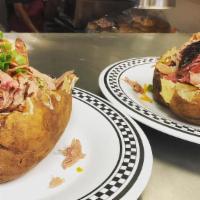 Bbq Stuffed Potato · Our loaded baked potato (Butter, Sour Cream, Cheese, and Chives) stuffed with chopped briske...