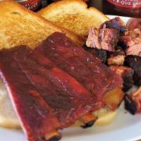 Rib & Burnt Ends Dinner · Three ribs, plus Burnt Ends. Served with one side dish and Texas toast.