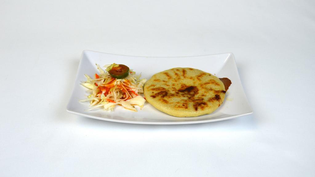Pupusas De Frijol Y Queso · Small grilled tortilla stuffed with bean and cheese.