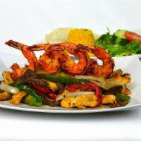 Mixta Plato · Grilled steak and chicken strips with four jumbo shrimp, grilled peppers and onions.