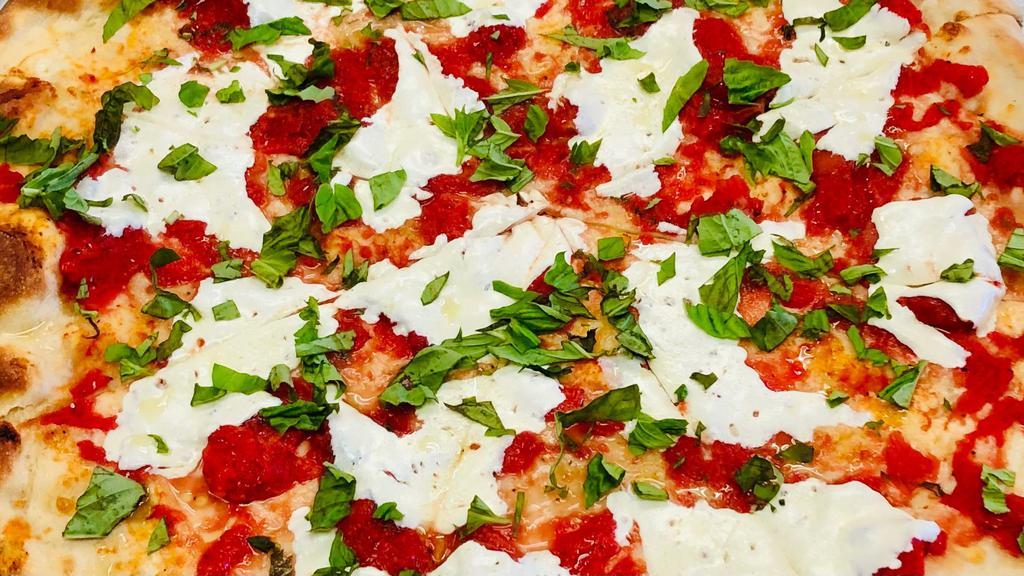 Margherita Pizza (Round) · Fresh mozzarella, margherita sauce & basil on a round crust pizza
