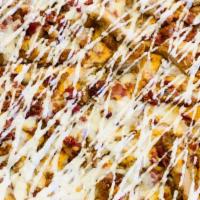 Chicken Bacon Ranch Pizza · Breaded chicken, bacon and ranch drizzle.