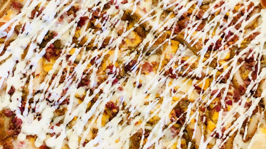 Chicken Bacon Ranch Pizza · Breaded chicken, bacon and ranch drizzle.