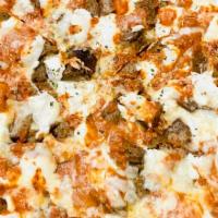 Vodka Parm Pizza · Choice of breaded chicken, breaded eggplant or homemade meatballs with our vodka sauce & ric...