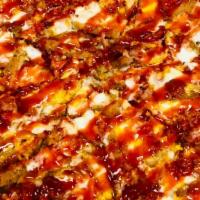 Bbq Chicken Bacon Pizza · Breaded chicken, bacon and BBQ sauce drizzle.