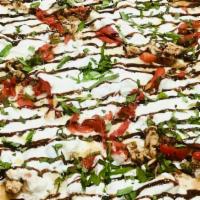 Grandma Roselli Pizza · Grilled Chicken, Breaded Chicken, Breaded Eggplant or Prosciutto with Fresh Mozzarella, Roas...