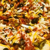 Vegan Taco Pizza · Vegan Chorizo, Jalapenos, Onions, Black Olives, Marinara Sauce, Vegan Mozzarella & Vegan Che...