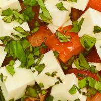 Tomato, Fresh Mozz & Basil Salad · Chopped tomato salad with fresh mozzarella, basil and olive oil.