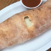 Stromboli · Mozzarella cheese stromboli. Add a variety of toppings from our selection. Served with marin...