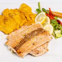 Salmon · Served with rice, tostones, fries, or vegetables.