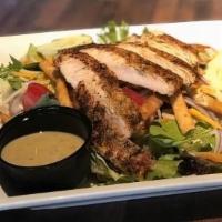 Southwest Chicken Salad · Grilled, Blackened, or Fried Chicken, Mixed Greens, Tomatoes,. Cucumbers, Cheddar Jack Chees...
