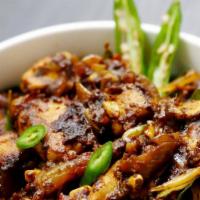 Mutton Varuval · Goat fry is spicy and delicious, and filled with tender mutton chunks. Sliced mutton, stir f...
