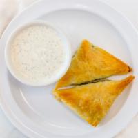 Spinach Pie · Spinach, feta, eggs & onion wrapped in phyllo served with Tzatziki.