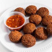 Falafel With Tahini Sauce · Fried ground chickpeas patty (8 pieces).