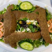 Lamb & Beef Gyros · Romaine lettuce, cucumber, crumbled feta, olives, tomatoes, and house dressing or ranch with...