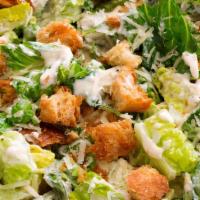 Caesar Salad · Crisp romaine lettuce, Parmigiano cheese and homemade croutons.