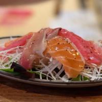 Sashimi Salad · A la Carte Only. Contains Raw Meat. Assorted fish with Spring Mix with Garlic Ponzu and Must...