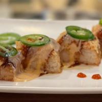 Crispy Rice With Spicy Crab · Crispy Rice topped with Spicy Crab and Jalapeno / Plum Wine Sauce, Eel Sauce, and Hot Sauce