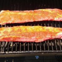 Louis Style Spare Ribs - Full Rack · A Full Rack of St. Louis Style Ribs - all natural, slow cooked each night in our own smoker....
