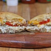 Tuna Melt · A classic on a Bialy with our house tuna salad, cheddar cheese and a bit of tomato.