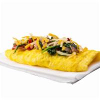 Omelet Station · Three eggs-whipped and three ingredients.