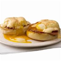 Classic Benedict · Two eggs-poached on an English muffin, ham, hollandaise sauce.