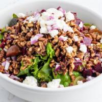 Roasted Beet Salad · Vegetarian.Gluten-free. Mixed greens, marinated beets, tomatoes, caramelized walnuts, red on...