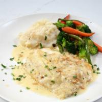 Petrale Sole · Wild Alaskan sole sautéed in a white wine
lemon garlic cream sauce, topped with toasted pine...