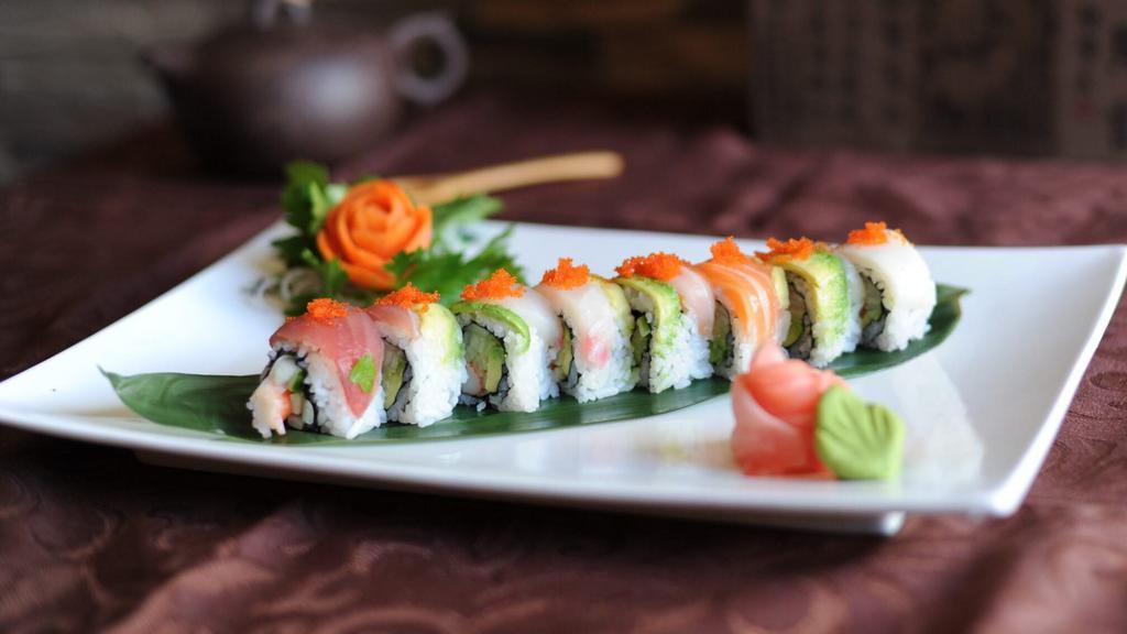 Rainbow Roll · Contains Raw Fish. Crab meat, cucumber, avocado inside tuna salmon red snapper white tuna on top.