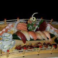 Love Boat For Two · Contains Raw Fish. Ten pieces sushi and fourteen pieces sashimi with volcano roll and shrimp...