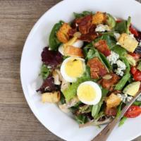 Atx Cobb Salad · 460 cal. Mixed greens, chicken, bacon, hard boiled egg, cherry tomatoes, avocado, blue chees...